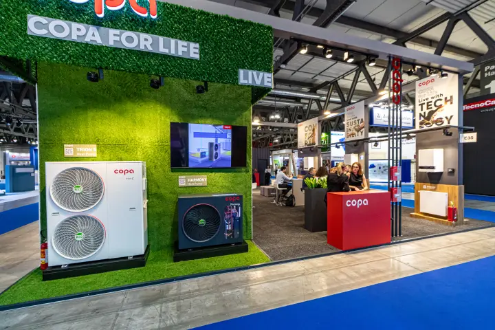 Copa stand with Trion S and Harmony heat pumps on a green grass wall at MCE 2024