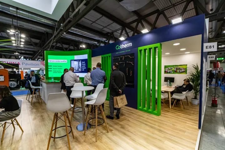 Cotherm thermostat display between green slatted partitions at MCE 2024