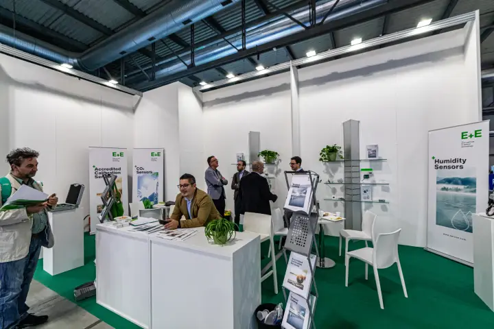 Counter and glass sensor shelves inside the E+E stand at MCE 2024