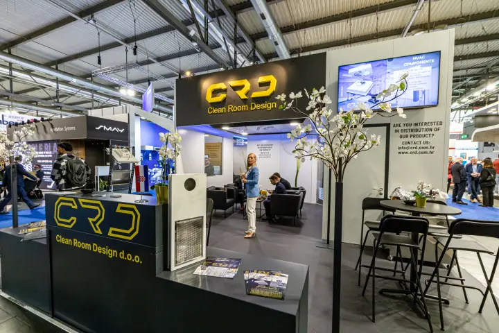CRD Clean Room Design stand with HEPA box screen and distribution notice at MCE 2024