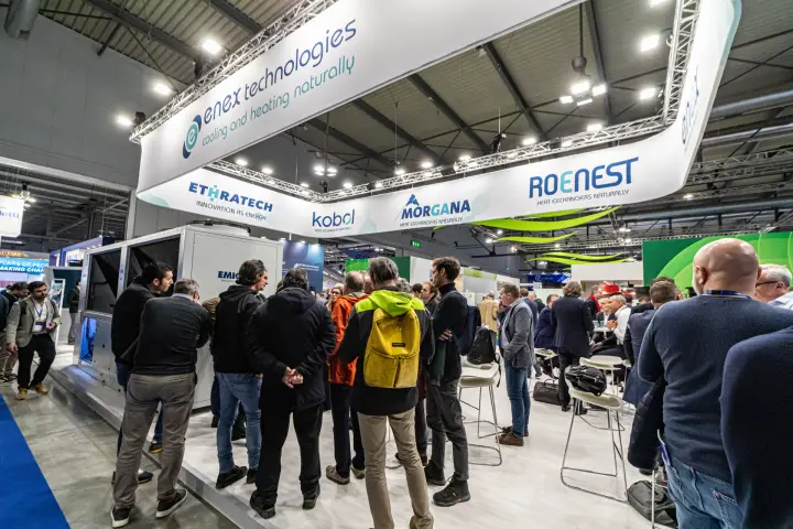 Crowd at the Enex stand under Ethratech, Kobol, Morgana and Roenest banners at MCE 2024