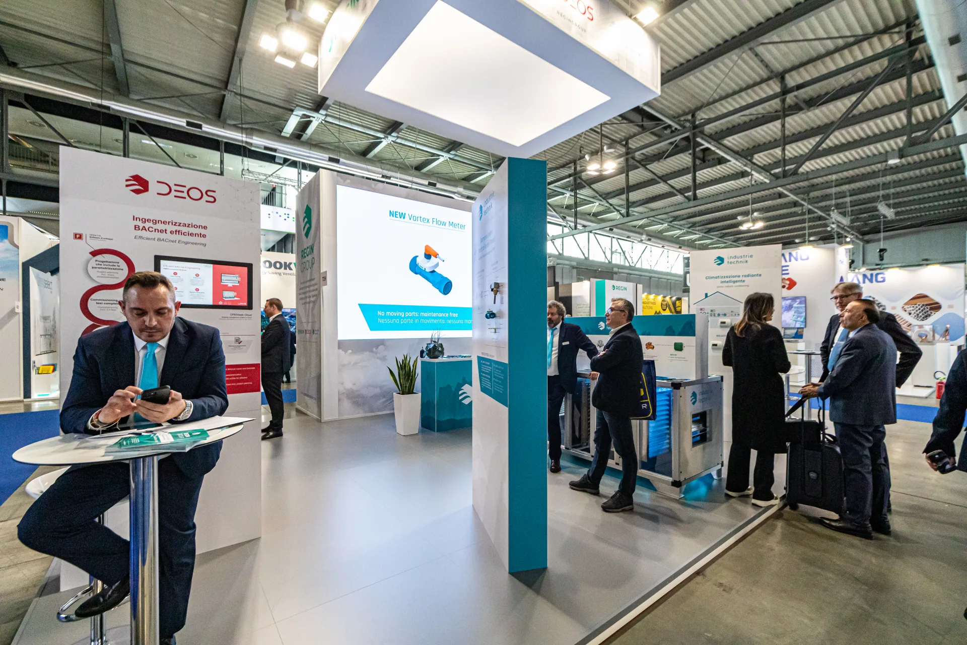 DEOS and Regin Group stand with new Vortex Flow Meter on LED screen at MCE 2024