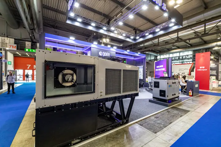Doğu rooftop unit with open fan section and 'Worldwide HVAC Solutions' panel at MCE 2024