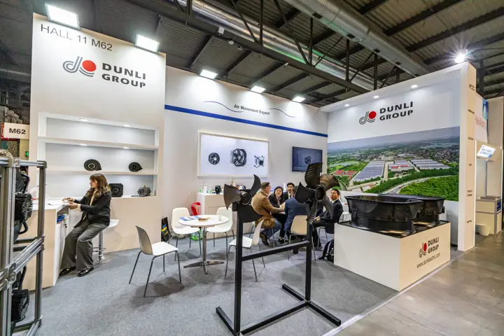 Dunli corner stand at Hall 11 M62 with fans and meeting area