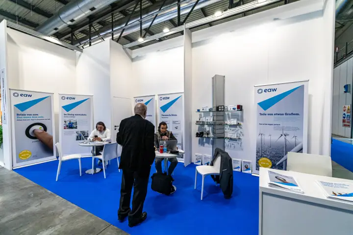 EAW Relaistechnik stand with relay banners and product shelf