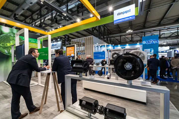ebm-papst centrifugal blowers and impellers on a long display rack at MCE 2024