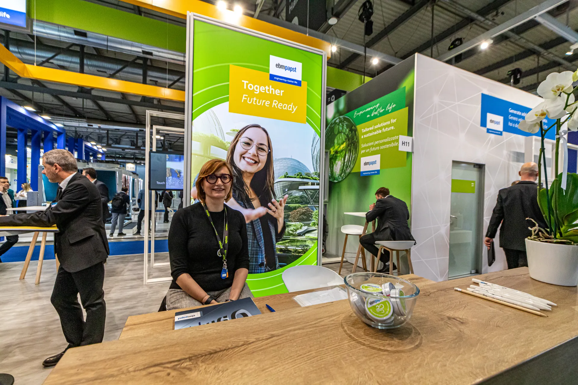 ebm-papst reception counter with the 'Together Future Ready' lightbox at MCE 2024