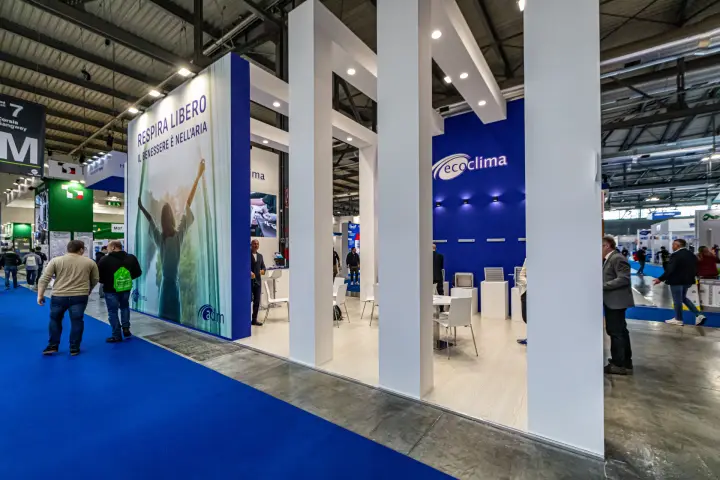 Ecoclima stand with white columns, blue walls and Respira Libero graphic at MCE 2024