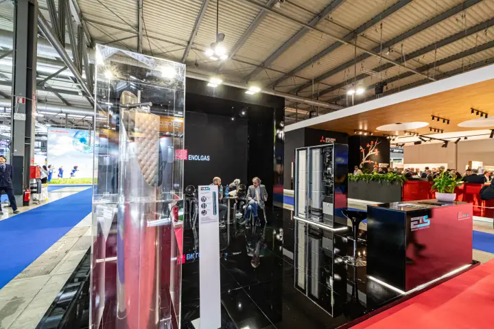 Enolgas stand with ETS counter and a sectioned steel cylinder in an acrylic case at MCE 2024