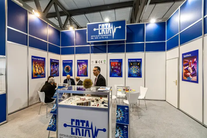Erta Elektromekanik stand with burner ignition parts in a glass showcase at MCE 2024