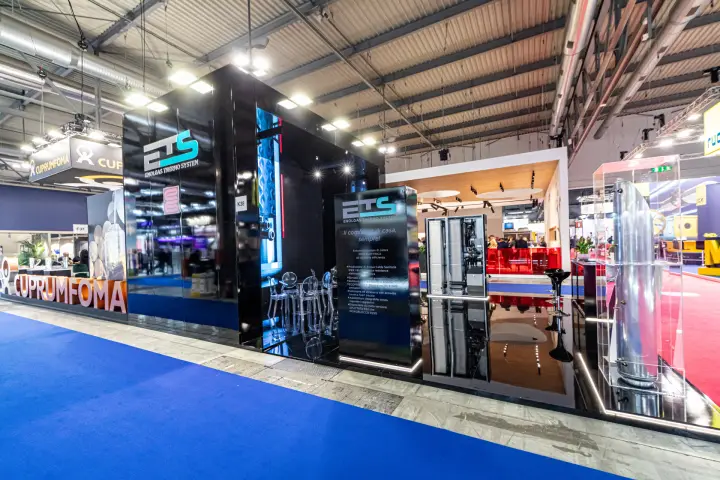 ETS Enolgas Thermo System stand with glossy black walls and heat pump water heater at MCE 2024