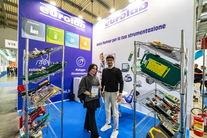 Eurolab stand with refrigeration tools and instruments on wire racks