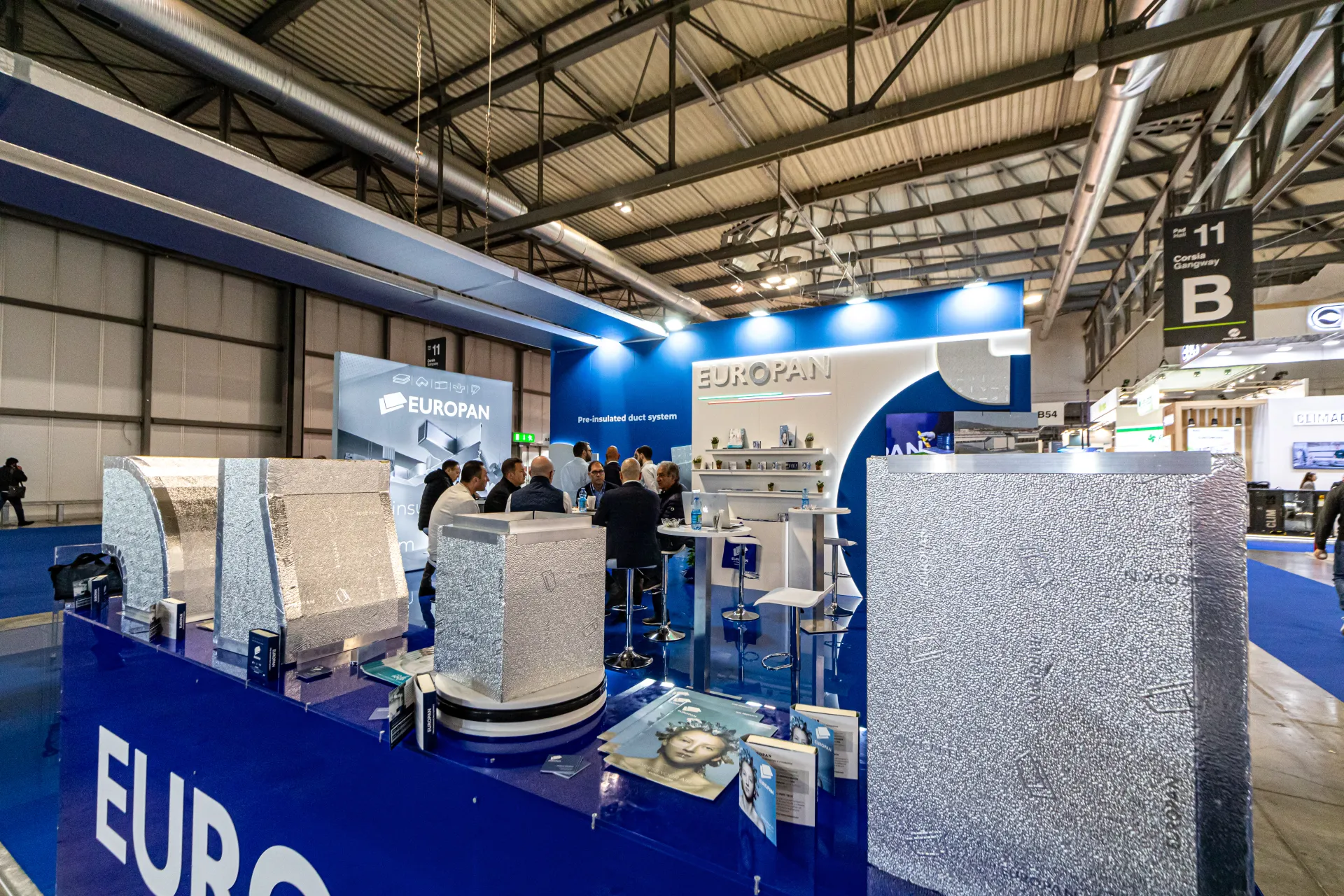 Europan pre-insulated duct samples on a blue counter at MCE 2024
