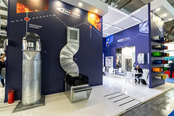 Evacclima fire-protection display with fan-topped duct column and twisted duct at MCE 2024