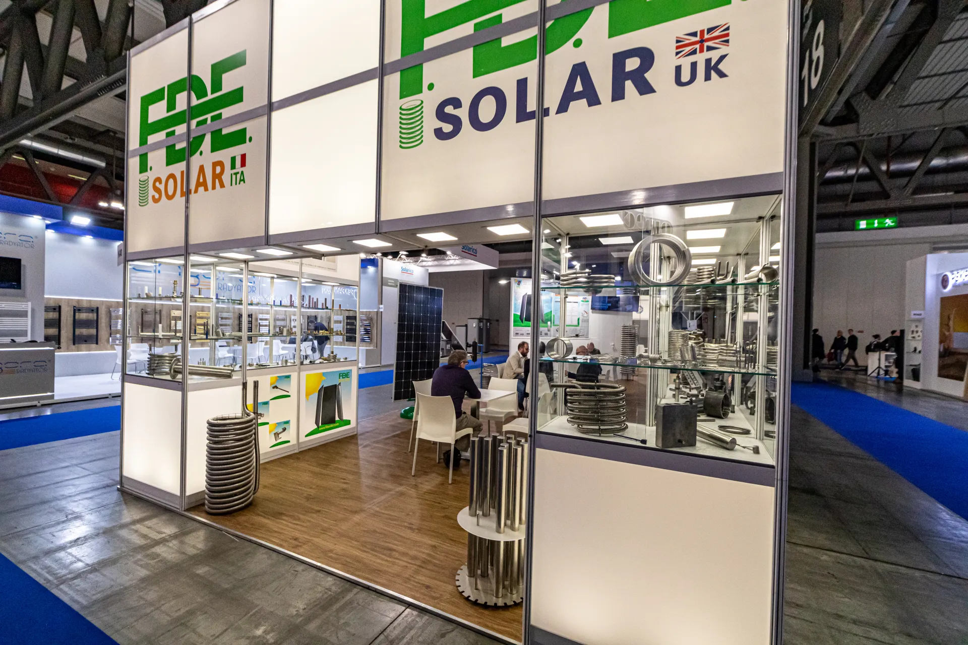F.D.E. Solar stand with stainless steel coils in glass display cases at MCE 2024