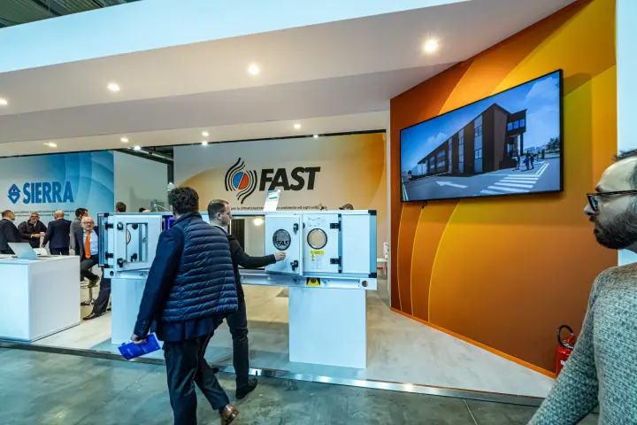 Fast stand with an open air handling unit and building render on screen at MCE 2024