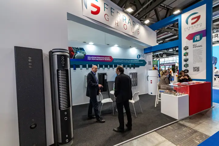 Ferraro Group stand with FG Tanks storage cylinders and sectioned tank