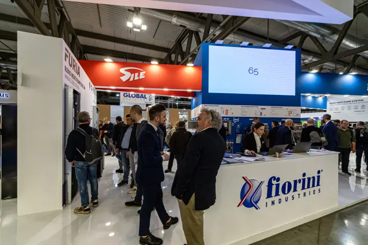 Fiorini Industries counter beside the Furia R290 in-wall heat pump display at MCE 2024