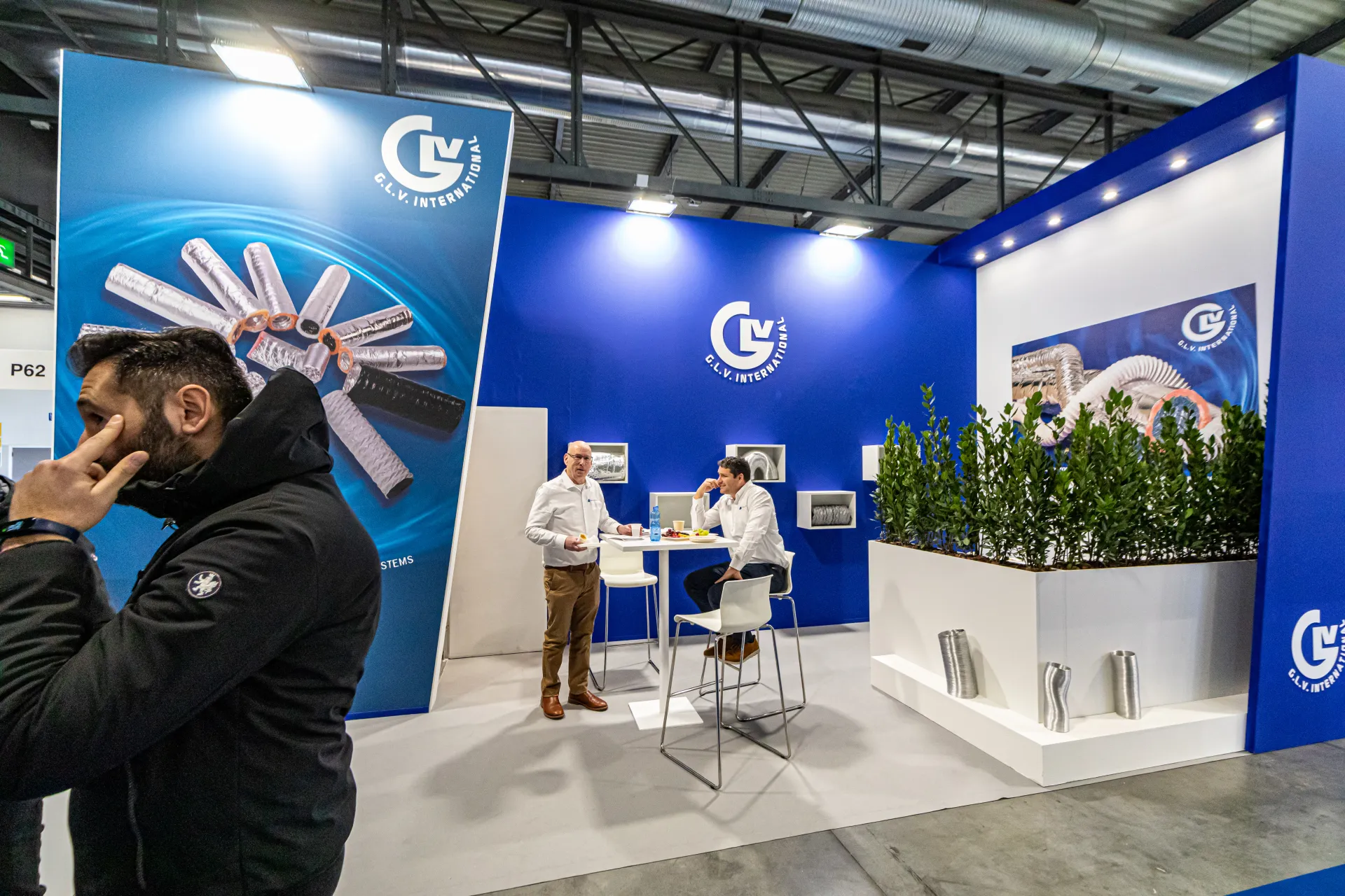 G.L.V. International stand with flexible duct graphics and shrub planter at MCE 2024