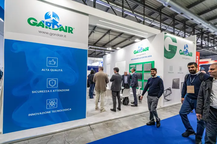 Gardair stand front with a blue panel of quality and safety values