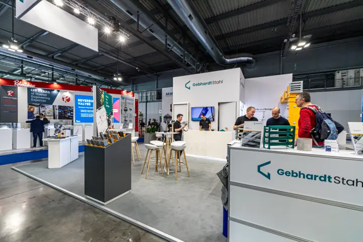 Gebhardt Stahl stand with fixing samples, high table and reception counter at MCE 2024
