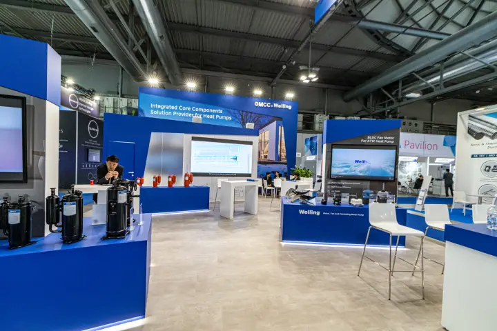 GMCC compressors and Welling motor and fan counter inside the stand at MCE 2024