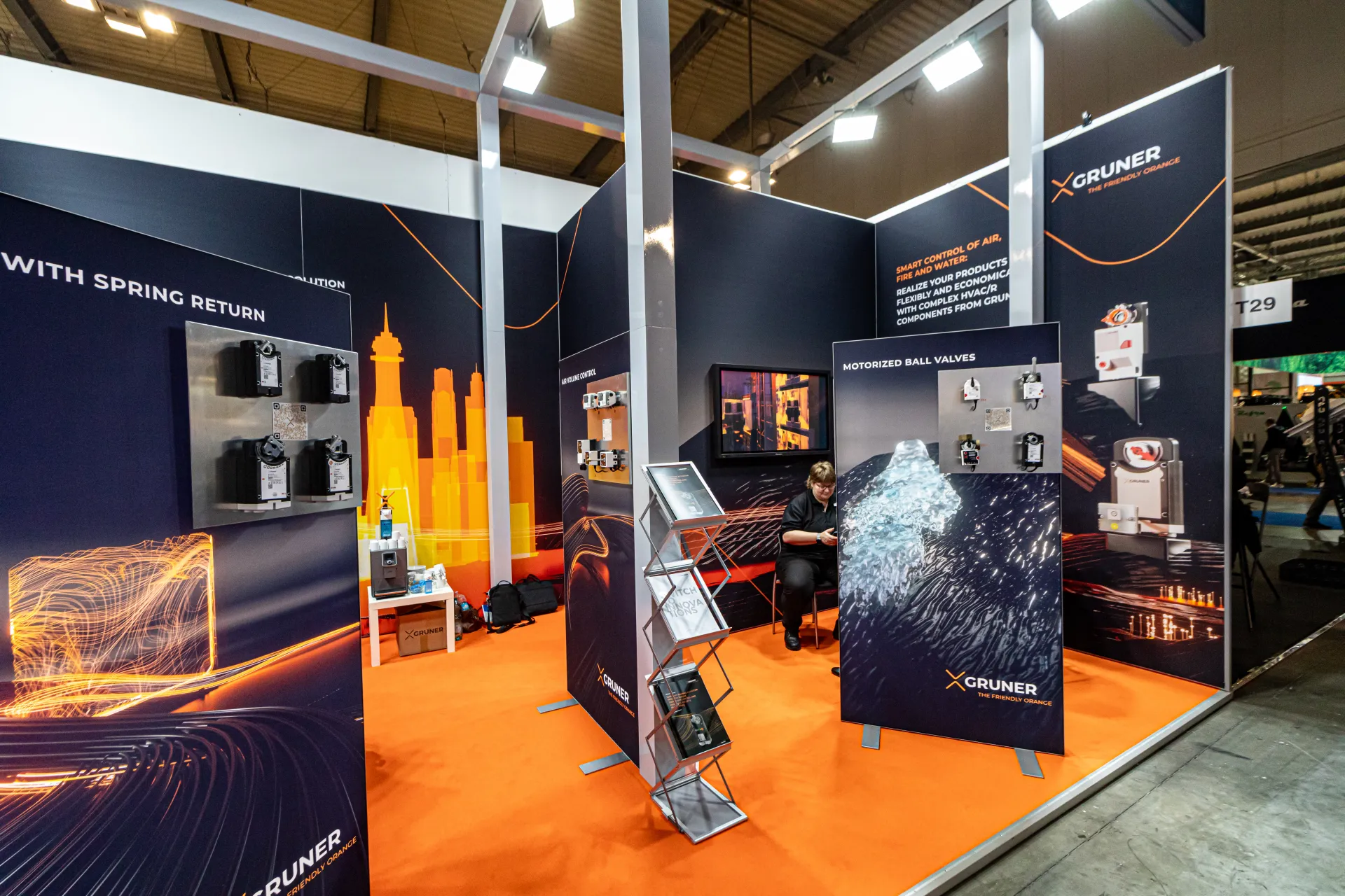 Gruner stand with actuators, motorized ball valves and orange carpet at MCE 2024
