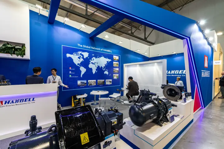 Hanbell screw compressors in front of the Global Network of Hanbell map at MCE 2024