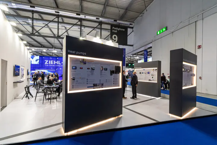 Heat pump and process cooling controller panels on a dark stand in Hall 9 at MCE 2024