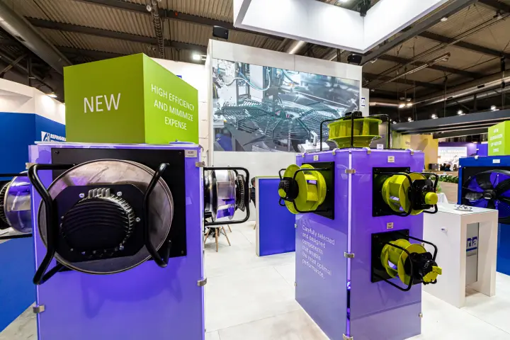 Hidria centrifugal plug fans on purple columns under a 'NEW' cube