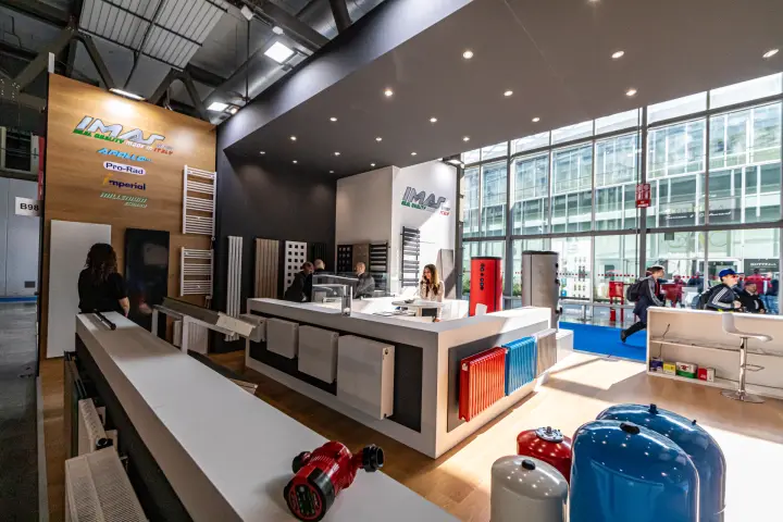 IMAS Group stand with wood brand wall, design radiators and vessels