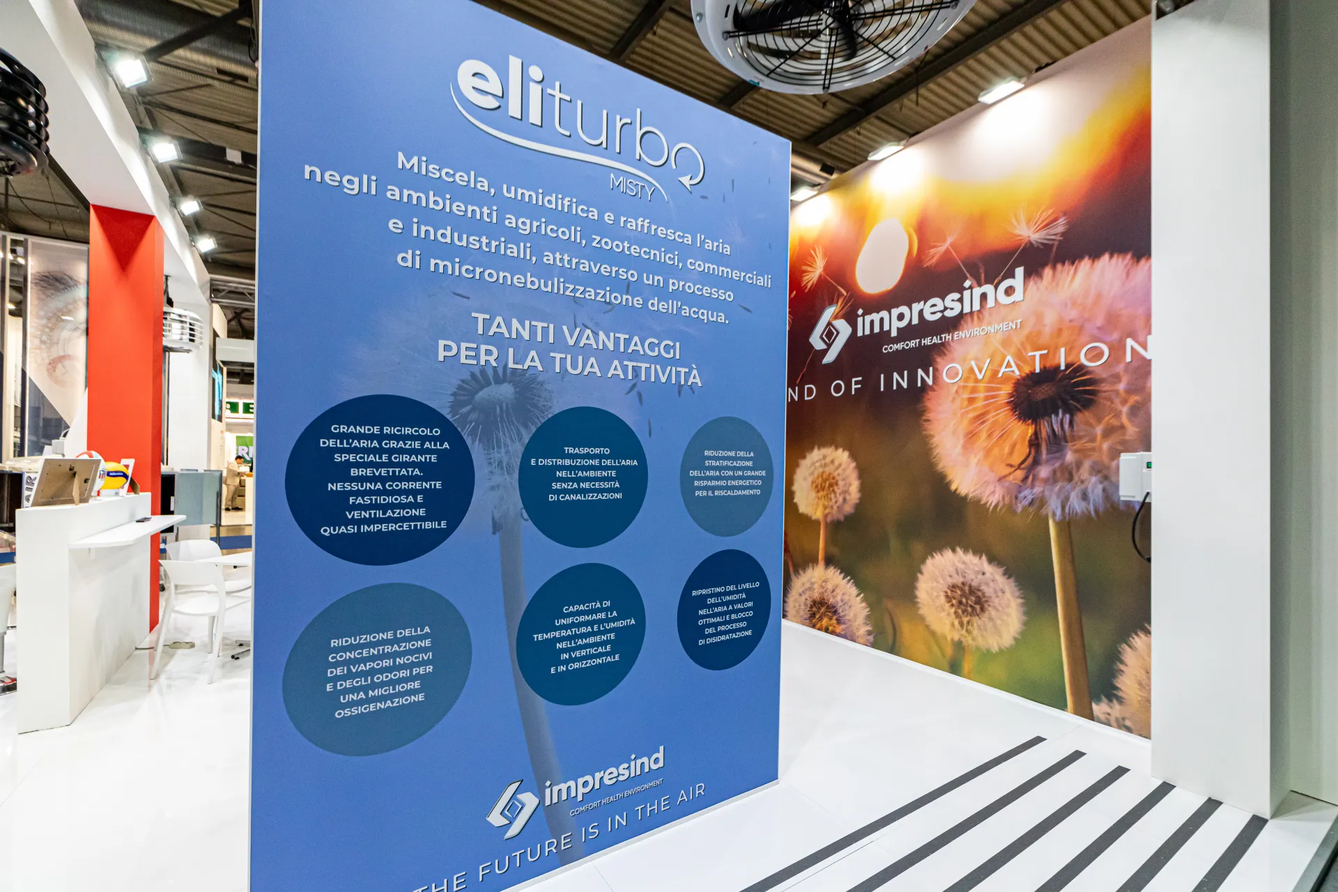 Impresind 'eliturbo MISTY' panel in Italian beside a dandelion graphic at MCE 2024