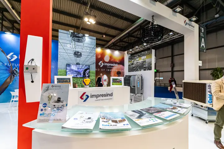 Impresind reception counter with Eliturbo and ColdAIR brochures at MCE 2024