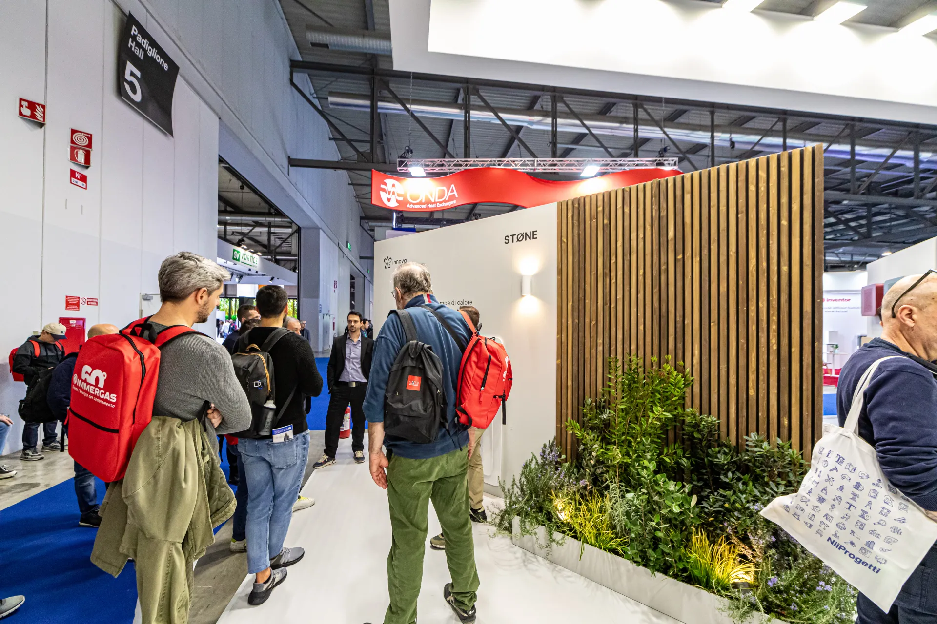 Innova Stone display with wooden slat wall and planted bed at MCE 2024