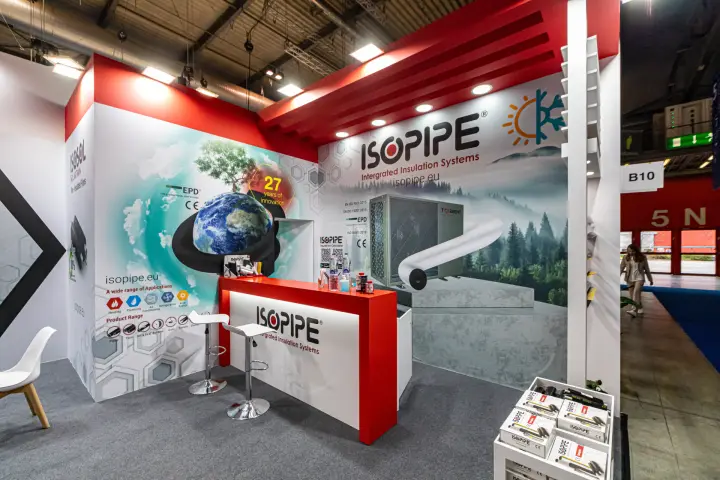 Isopipe stand with pipe insulation graphics and a red reception counter at MCE 2024