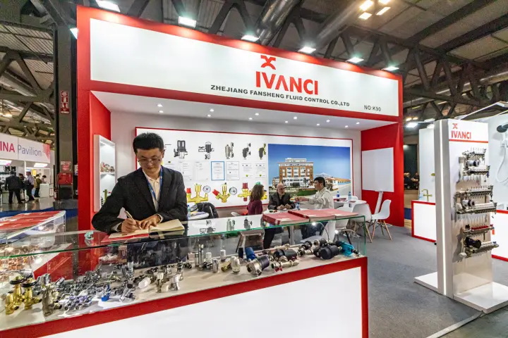 Ivanci stand with radiator valves and manifolds in a glass counter at MCE 2024