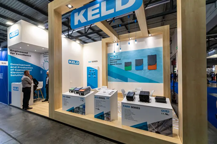 Keld stand with KMD, KTS and Farm series drives in a wooden frame