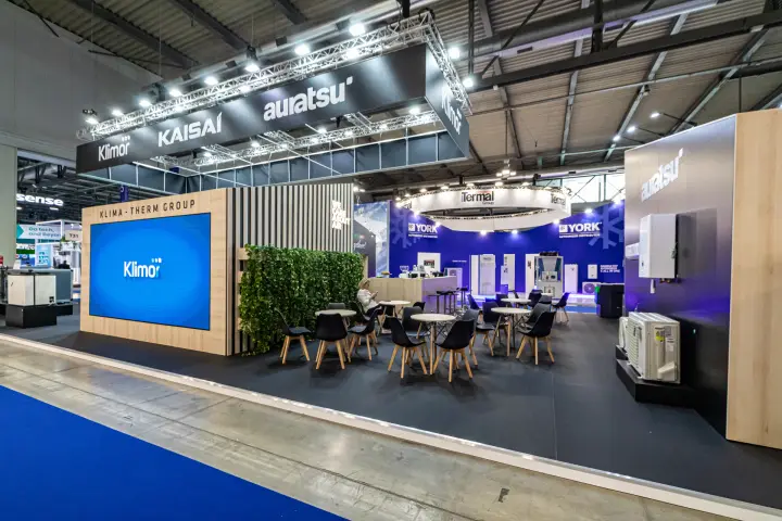 Klima-Therm Group stand with Klimor video wall and lounge tables at MCE 2024