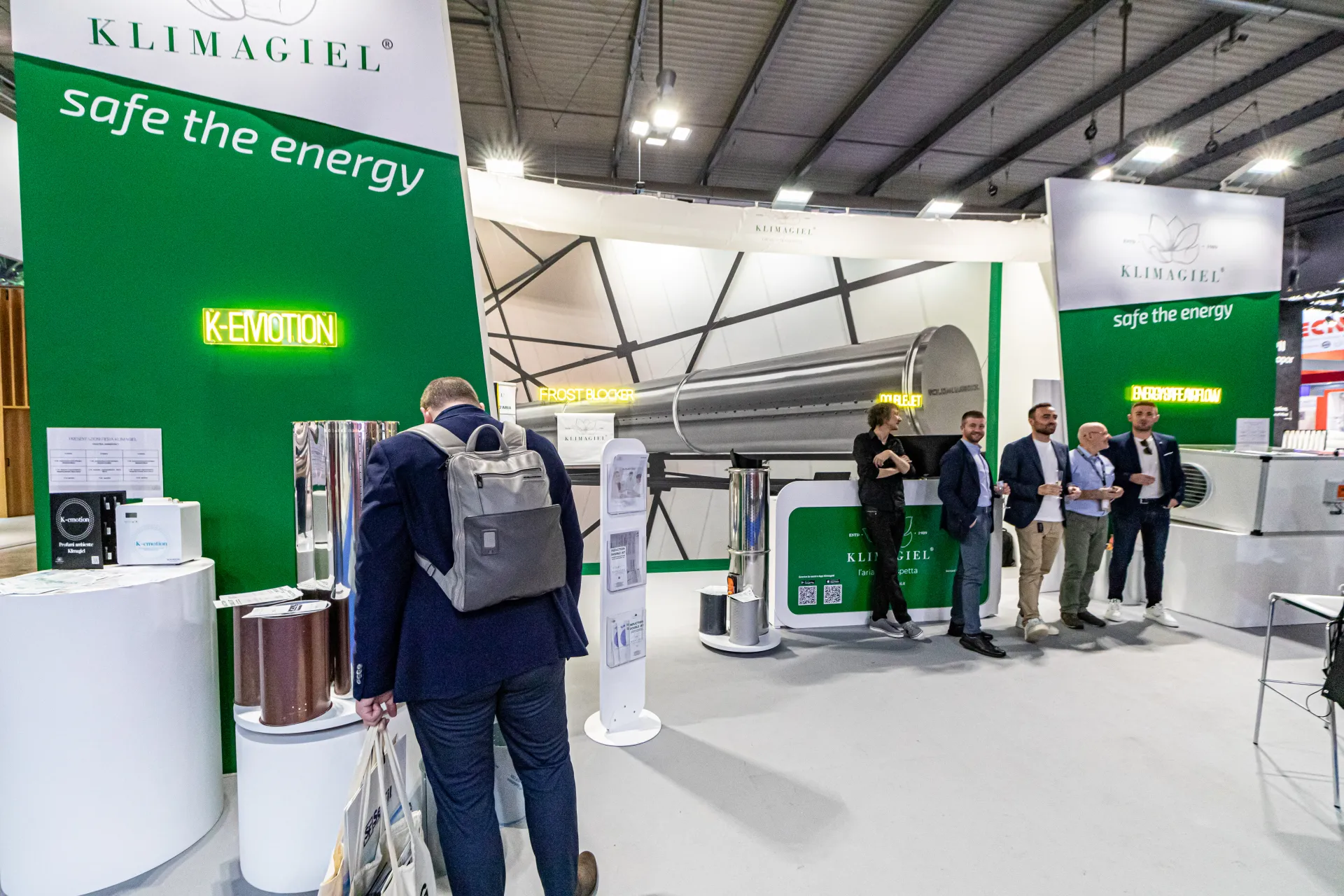 Klimagiel stand with 'safe the energy' wall and K-EMOTION display at MCE 2024