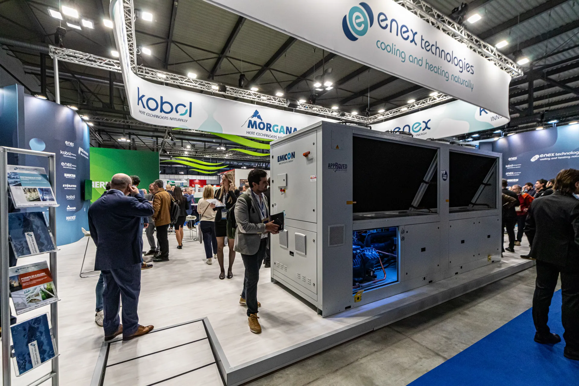 Large Emicon unit beneath Kobol and Morgana banners on the Enex stand at MCE 2024