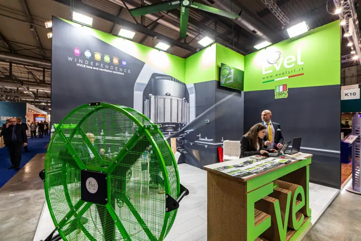 Large green Evel drum fan in front of the K10 stand at MCE 2024