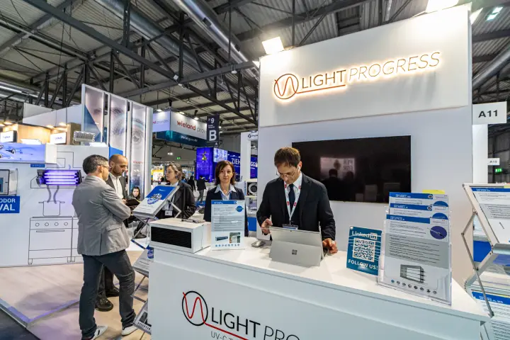 Light Progress counter with UV-C product sheets and backlit logo at MCE 2024