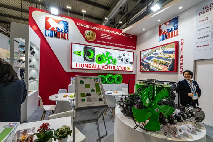 Lionball stand with green axial fan and small fan motors on a round plinth at MCE 2024