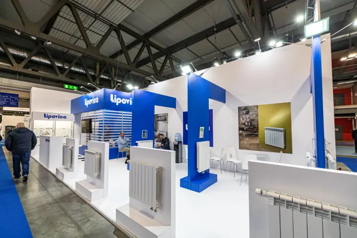 Long view of the Lipovica stand with radiators and interior photo wall