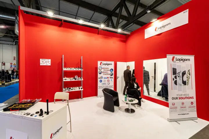 Lopigom red stand with rubber seal samples on wall shelves