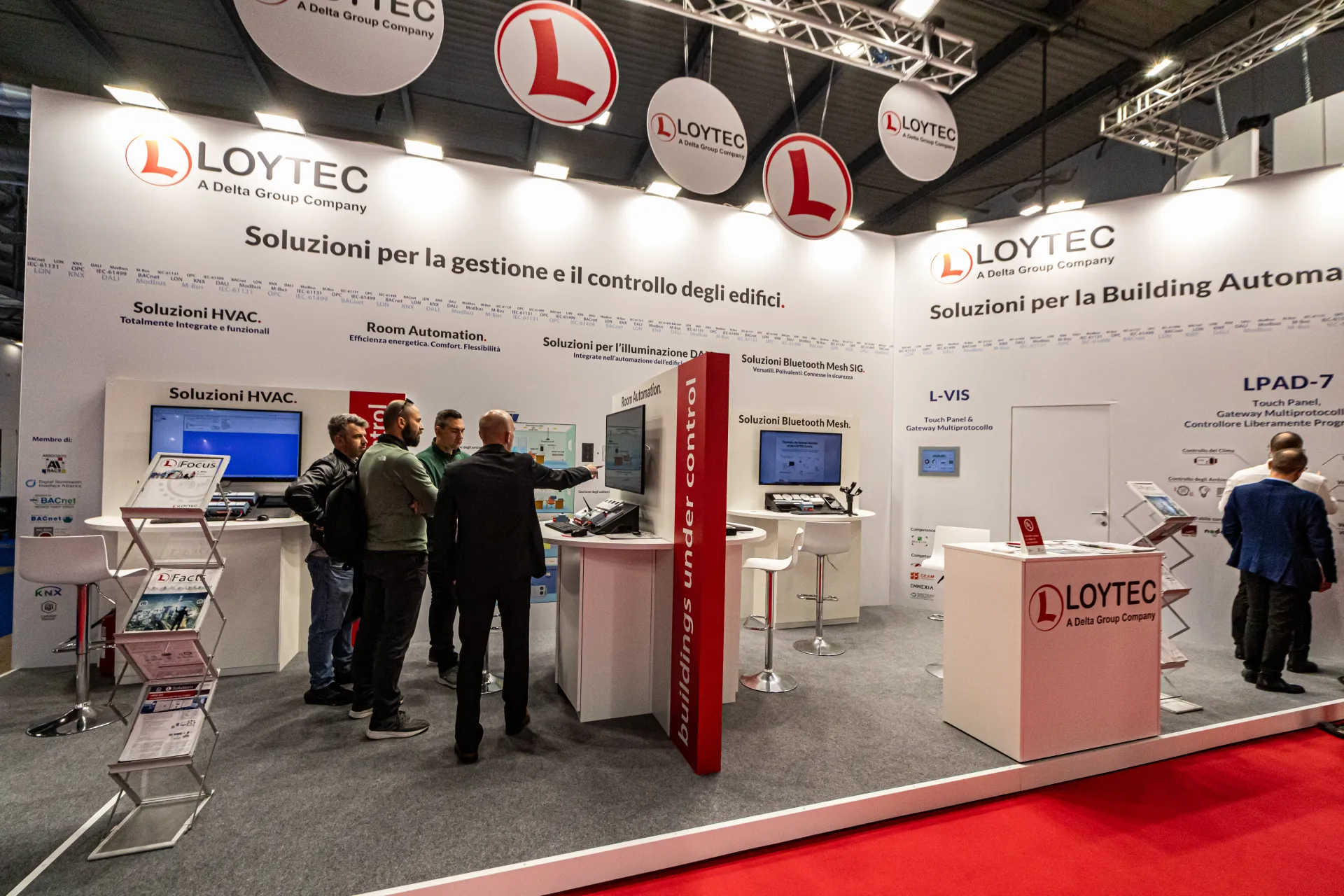 Loytec stand with building automation demo stations and hanging discs at MCE 2024