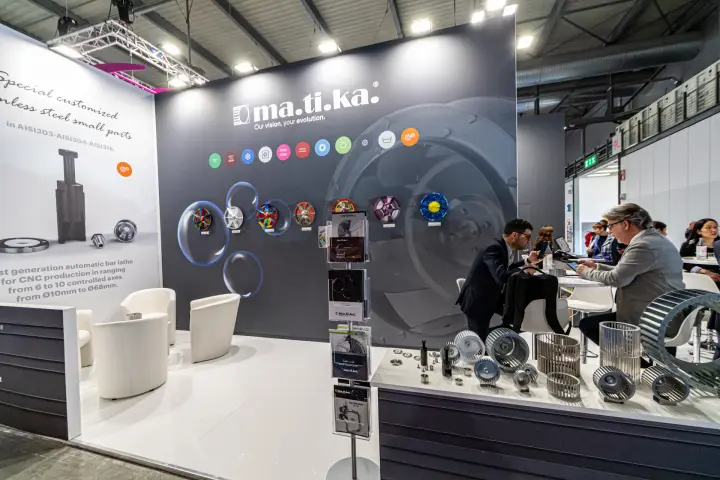 Matika feature wall with painted impellers and brochure stand at MCE 2024