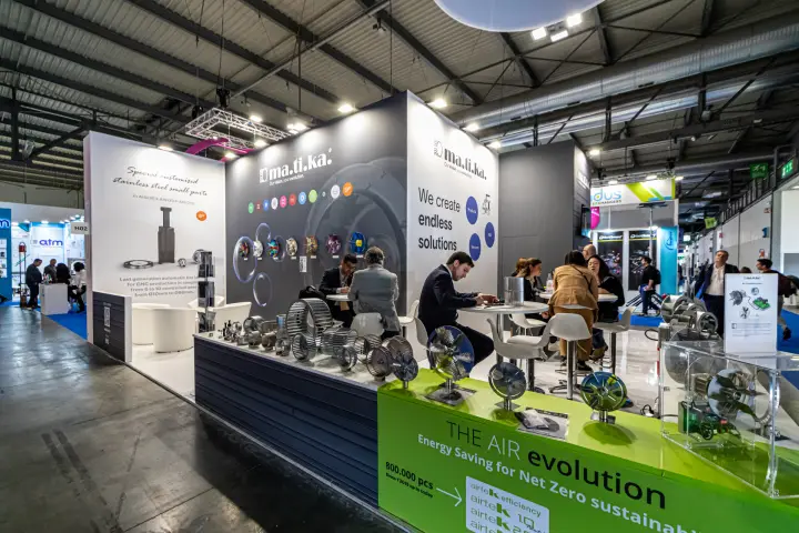 Matika stand corner with a green airteK counter and impeller displays at MCE 2024