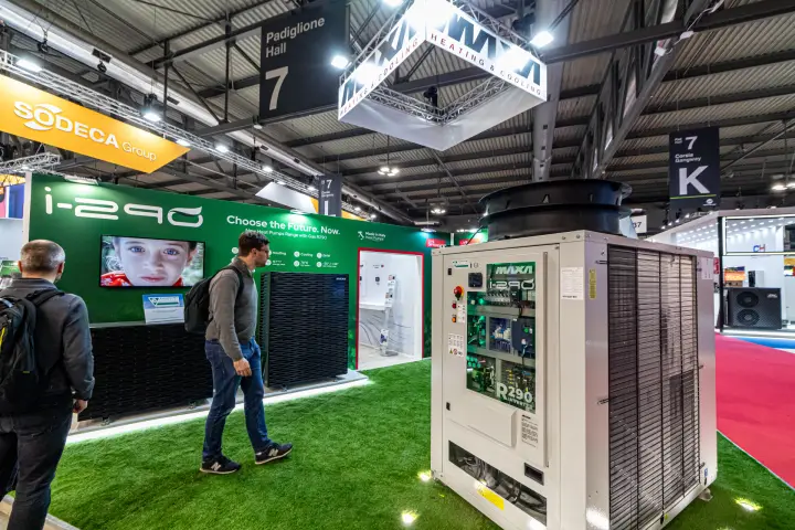 Maxa i-290 R290 heat pump range with a glazed-front unit on green turf at MCE 2024