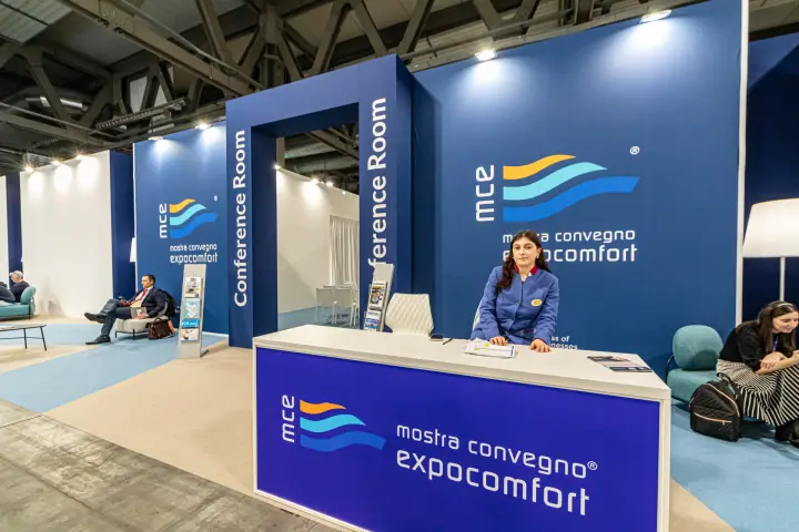 MCE organiser desk in front of the conference room entrance
